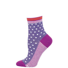 Purple sock with white polka dots and pink and orange stripes on a white background