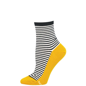 Black and white striped sock with yellow toes on a white background