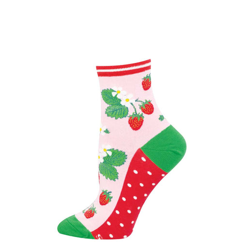 Colorful sock with strawberry pattern on a light pink background