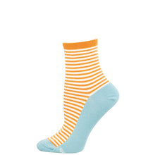Striped socks with orange and light blue pattern on a white background