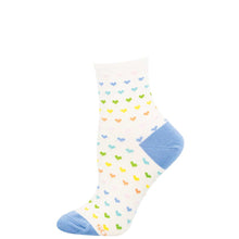 White sock with colorful heart pattern and blue toes and cuffs on a white background